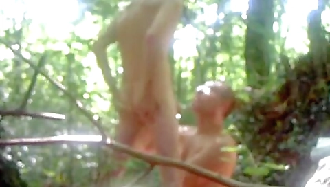 Vintage amateur video with a blonde woman riding a bike
