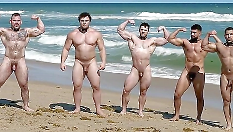 Two men on the beach with a group of ladies riding