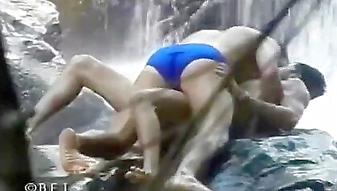 Sexy guy loves to ride his black condom lover on the beach