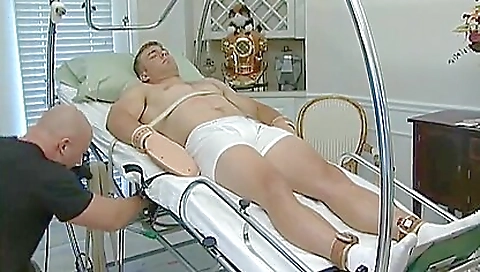 Amature fetish video with a bald man stripping a busty client