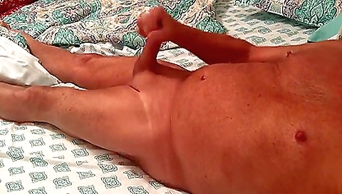 Sexy mature woman with big tits fucks in her own mouth