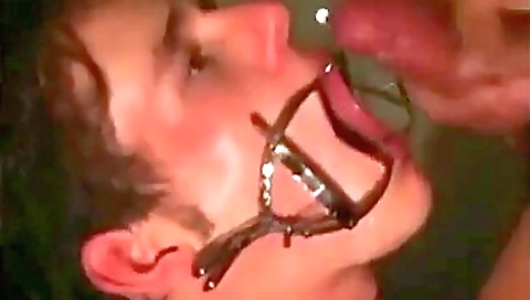 Busty lady with a tattooed face gets fucked in her throat